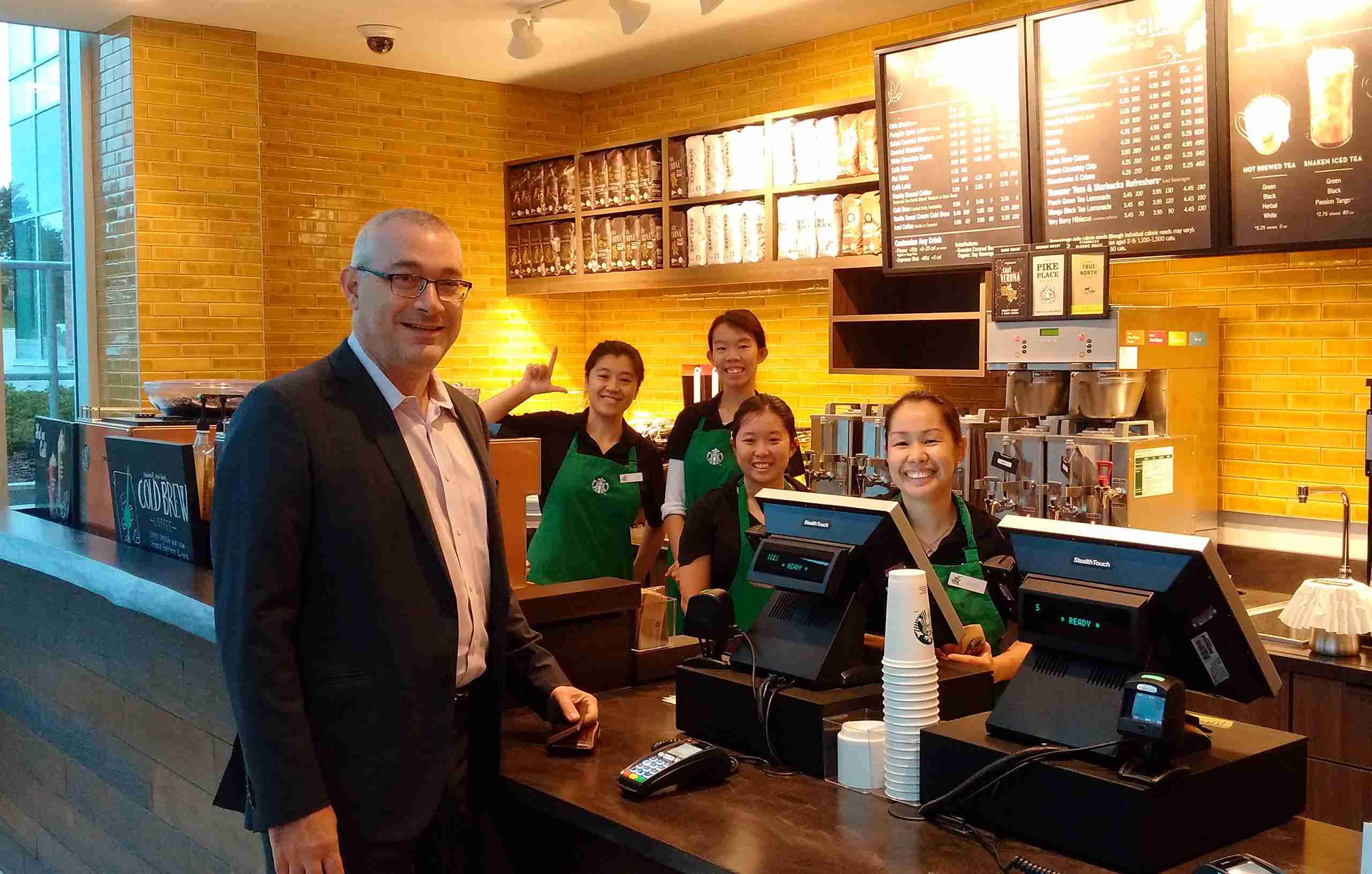 Dean James Rush with Starbucks staff.