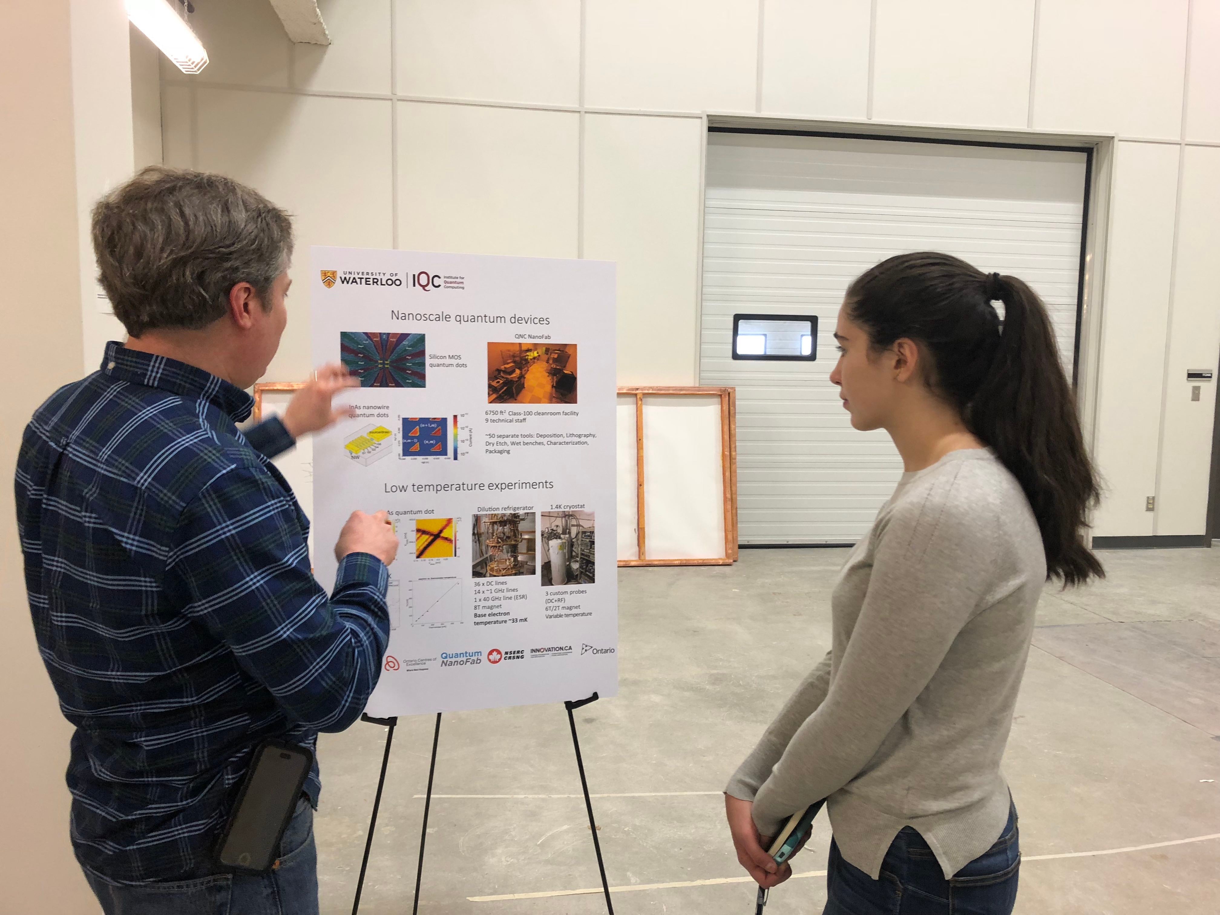 Prof. Baugh explains how nanoelectronics devices to visiting high school student Cassia Attard