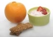 Orange, bowl of yogurt, granola bars