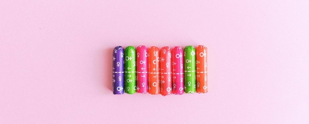 multicoloured tampons lined in a row
