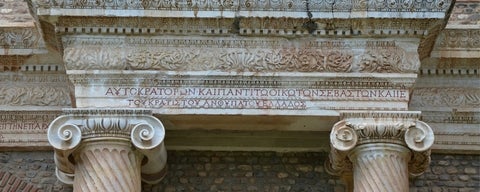 Front detail with lettering on ancient temple