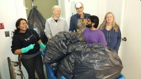Members of the Library's LibGreen group get ready to conduct a waste audit at the Davis Centre Library.