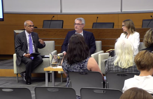 President Vivek Goel, Provost Jim Rush, and VP Administration and Finance Jacinda Reitsma sit in chairs during the town hall.