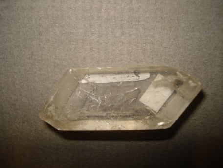 gypsum crystal on grey background