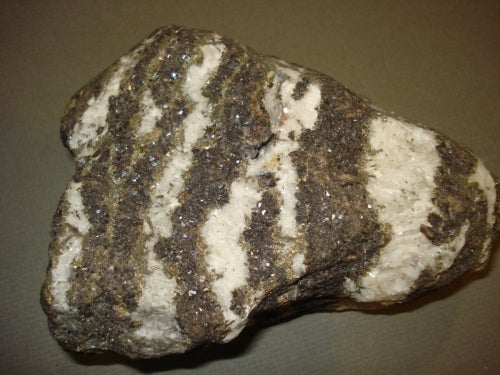 brown and white striped ore