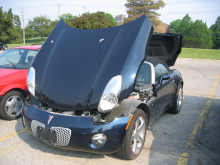 Pontiac Solstice with front and rear deck lids open