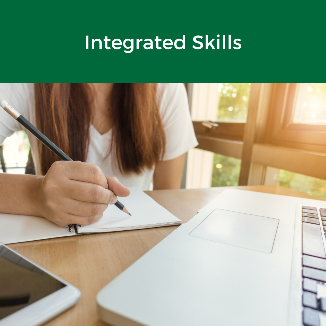 integrated skills in green banner above a picture of someone writing with a pencil in a notebook