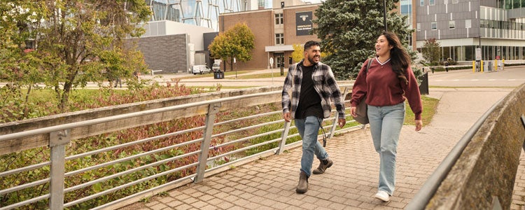 Student's walking through campus. 