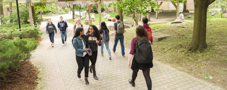 Waterloo students walking on campus.