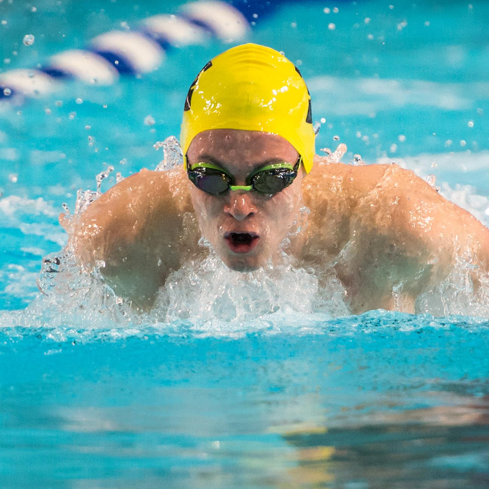 Lukas swimming in a race