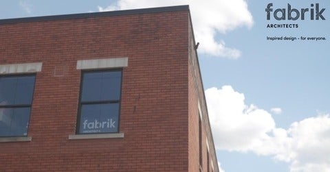 Exterior view of Fabrik Architects building with the company logo
