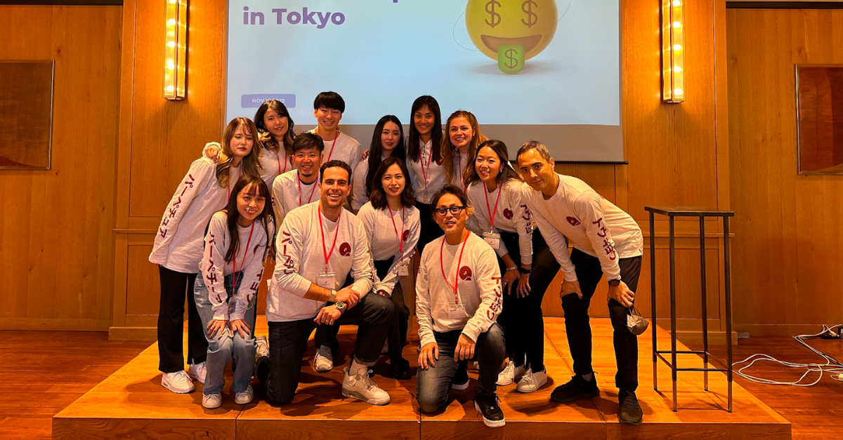 Group of Perpetua employees and co-op students smiling for a group shot at a seller meet up in Tokyo