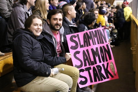 Spectators at Aftab Patla Memorial Cup  holding a pink sign which reads : " Slammin Salmon Stark"