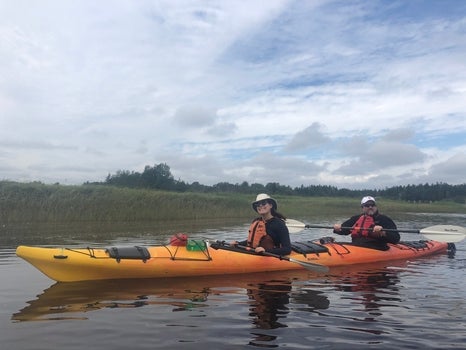 Léa in a kayak with professor