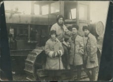 Harry Byers and students in front of a tractor