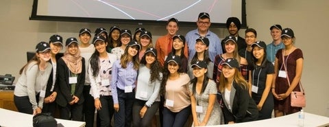 CAP students wearing baseball caps