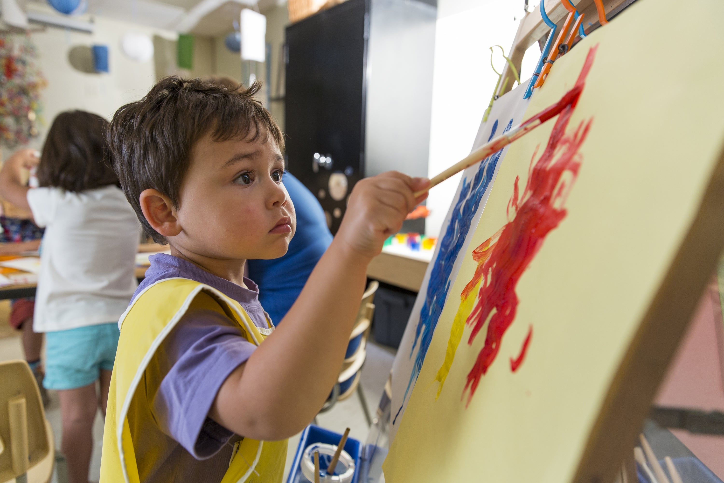 A child painting.