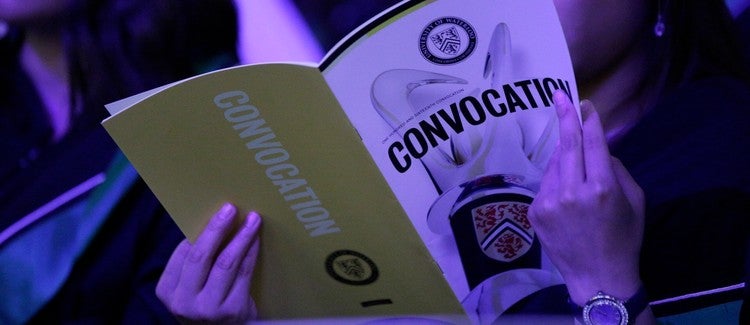 convocation booklet being viewed at a convocation ceremony