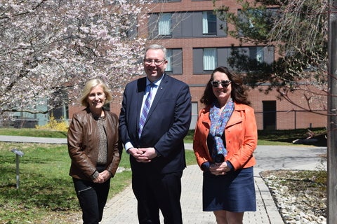 Board Chair Karen Spencer, incoming President Marc Jerry, and current President Wendy Fletcher stand in Renison's East West Garden. 
