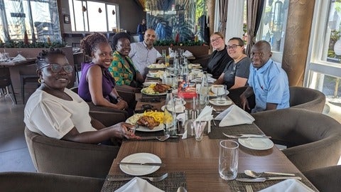 wusc team having a meal in Uganda