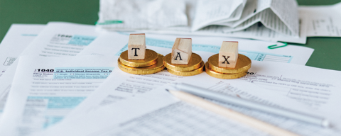 Tax documents with the word TAX 