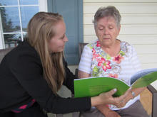 Rachel Thompson reads with her grandmother