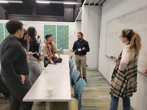 people talking in workshop