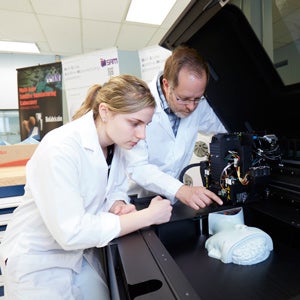 Mark Barfoot with student in additive manufacturing lab