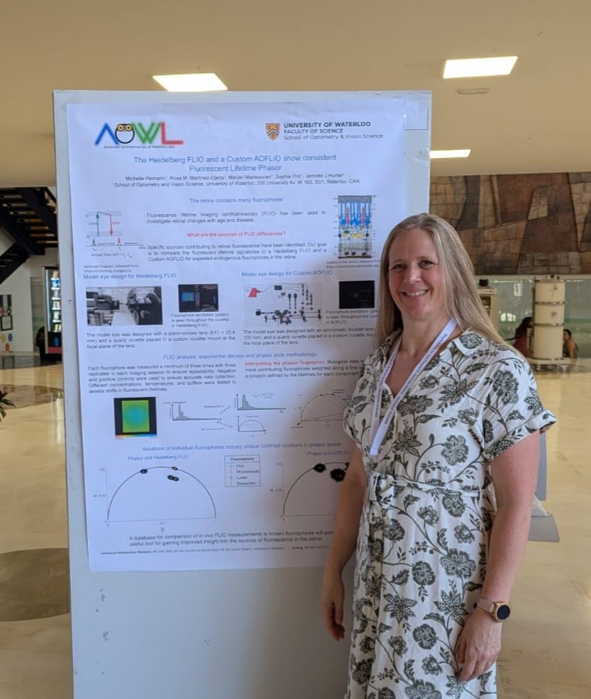 Michelle presenting her poster at BER2025 conference