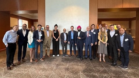 Alumni group poses at an event in Miami