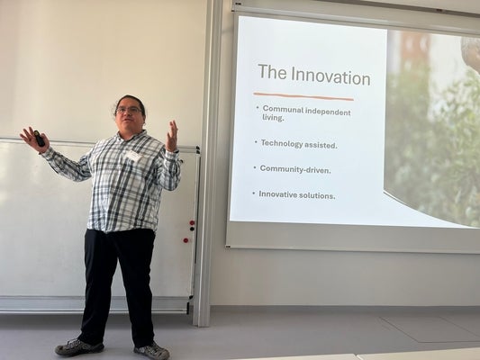 University of Waterloo researcher presenting at a conference