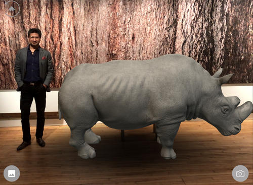 Vikas Gupta next to Sudan, the last male Northern White Rhino, in Augmented Reality