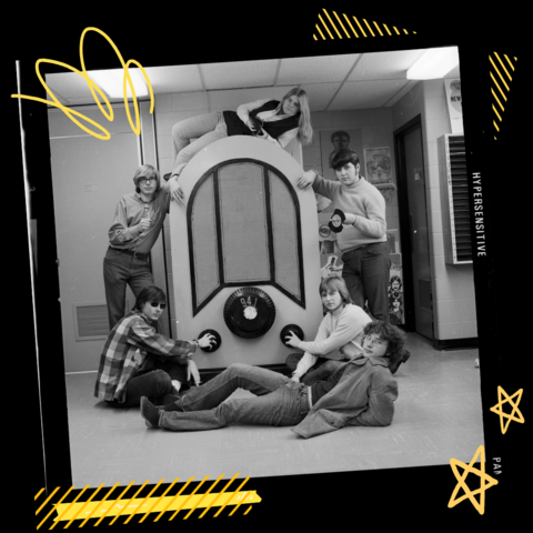 Students captured on film with yellow graphics in background