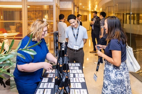 Guests picking up their nametags at an event