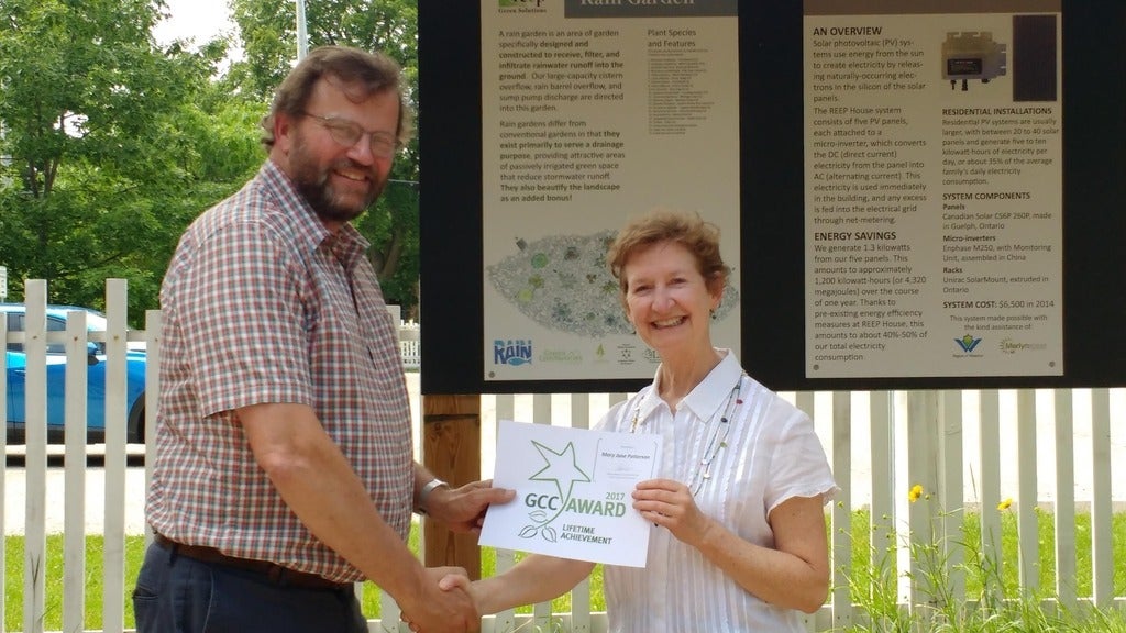 Mary Jan recieving an award for making the community greener
