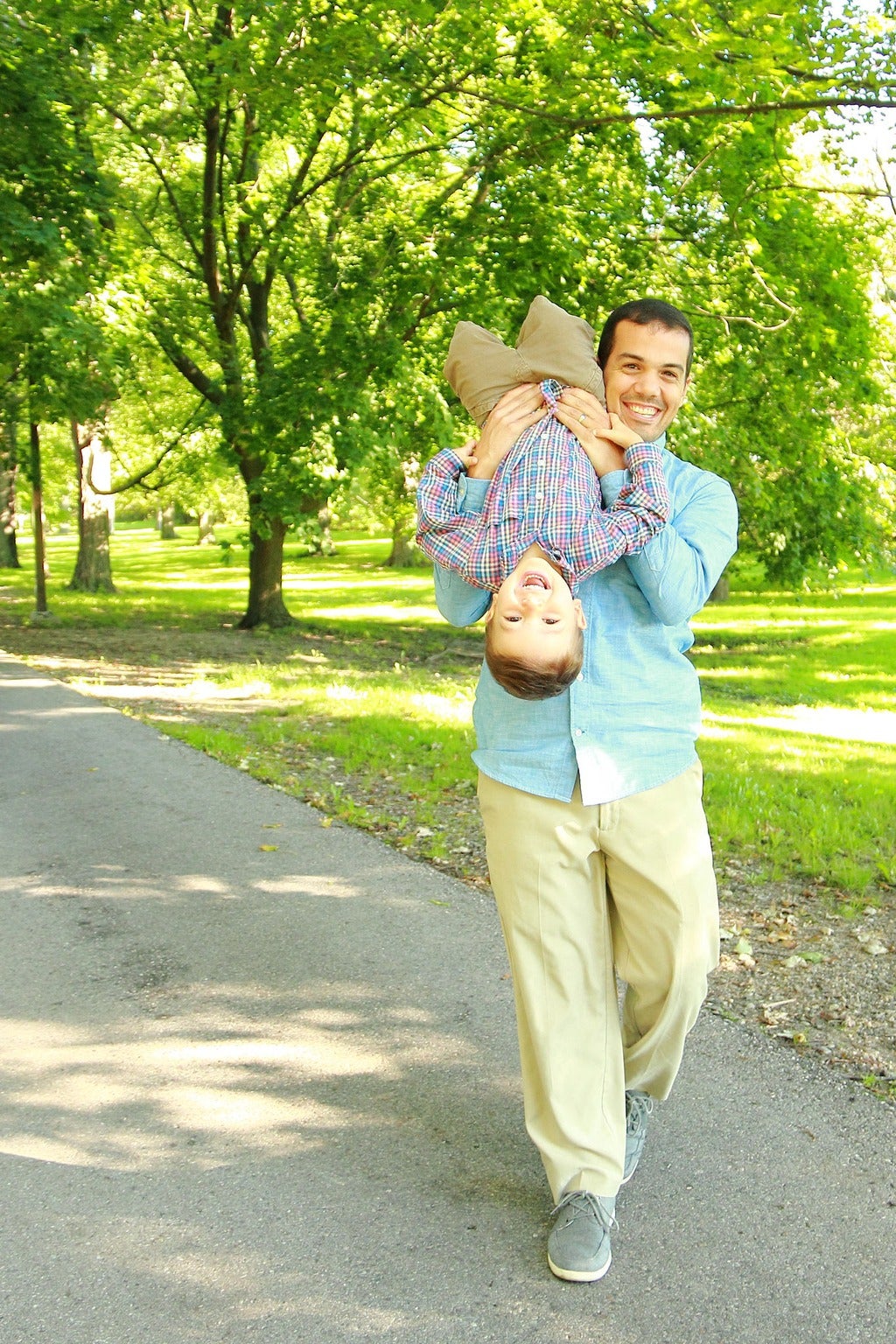 Zamir and his son playing outside
