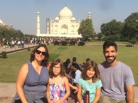 Sabrina and her family in front of a castle