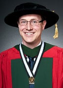 Jeremy Clark wearing gold medal