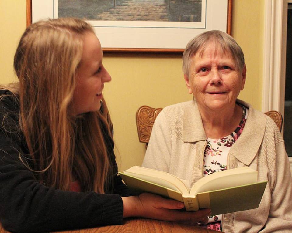 Rachael reading with her grandmother