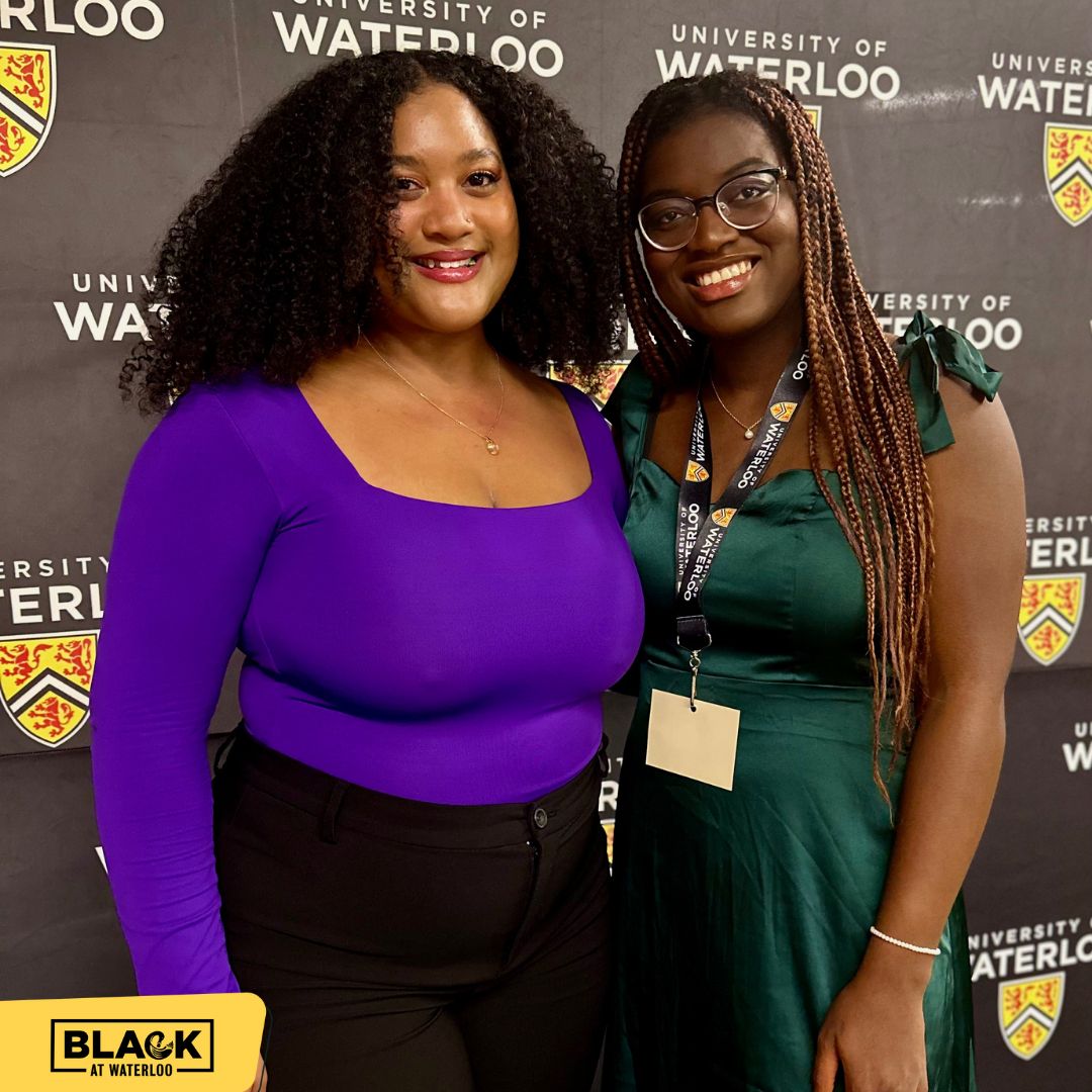 2 ladies smiling at camera at celebrating black communities event