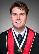 Alexey Fridman wearing gold medal