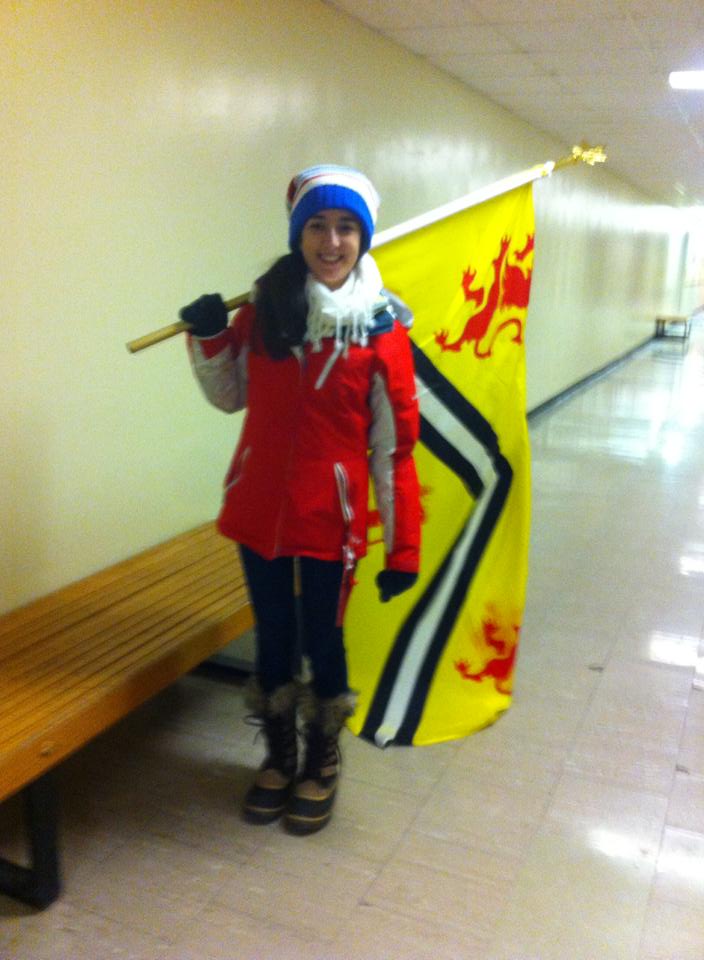 Amanda carrying the uWaterloo flag.