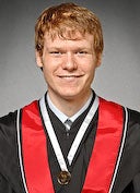 Michael Allison wearing gold medal