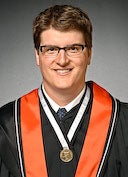 John Casey wearing gold medal