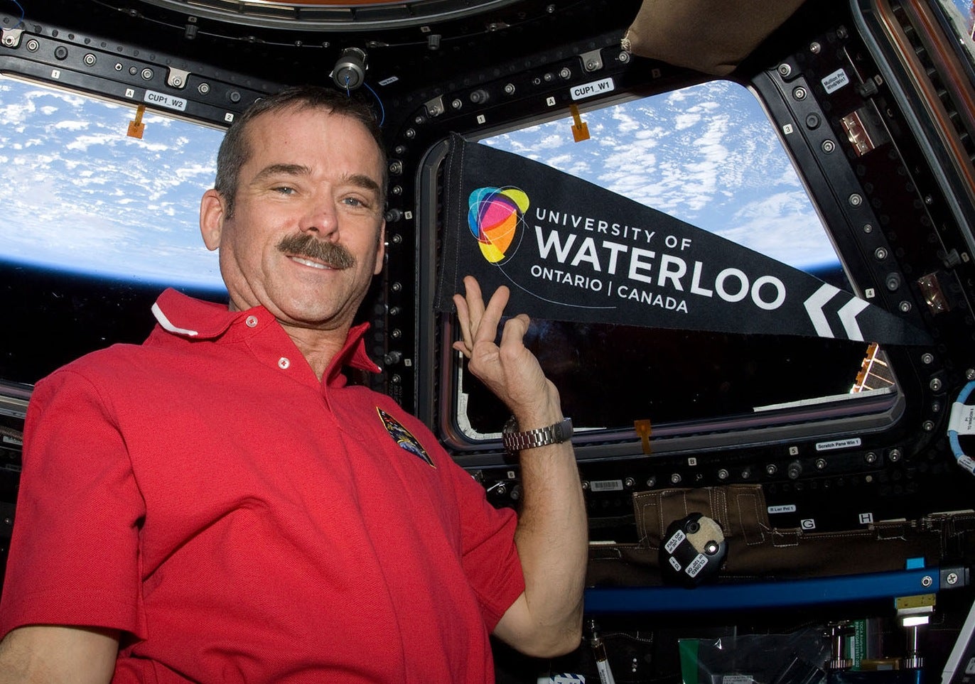 hadfield with waterloo sign