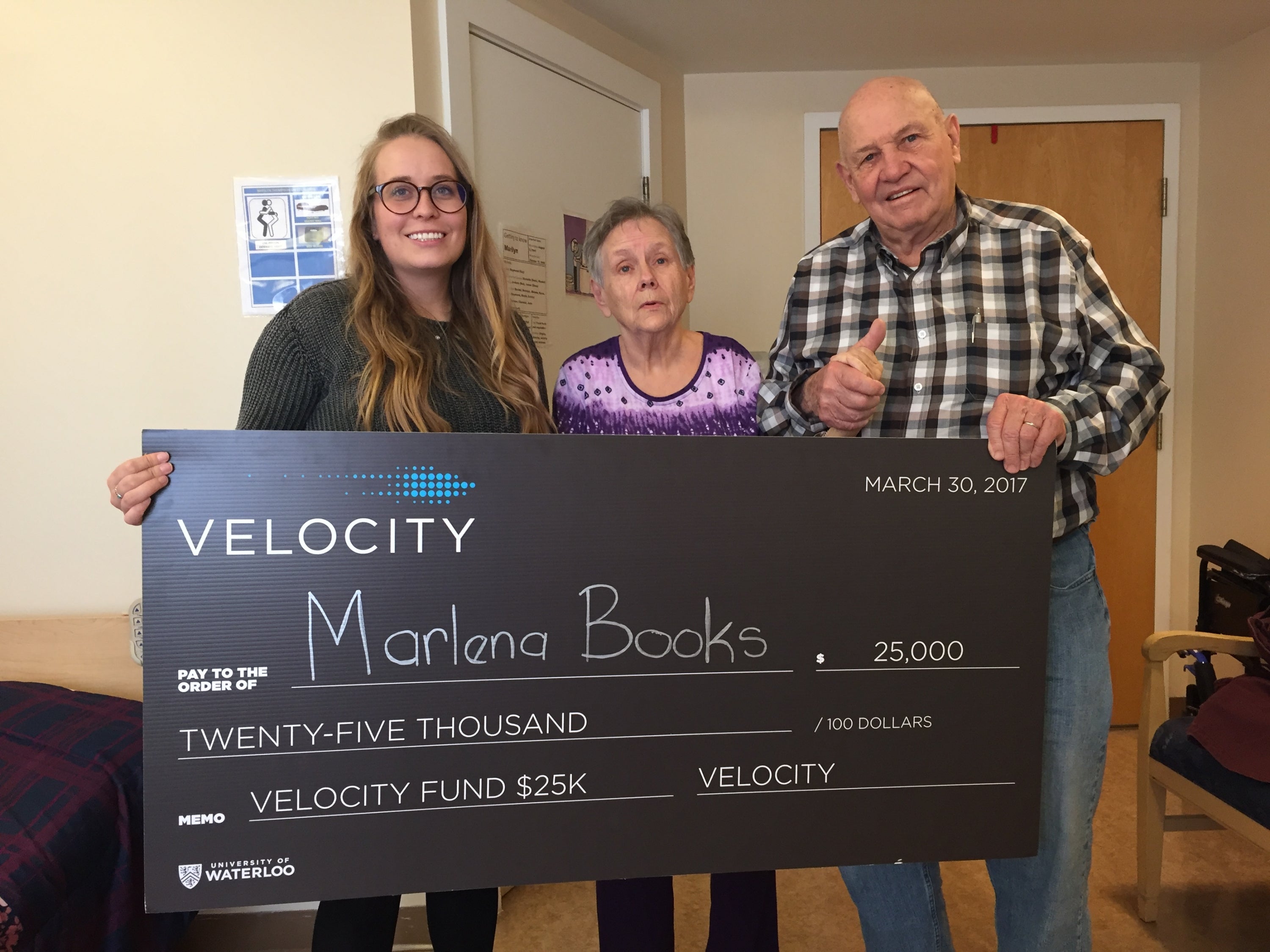 Rachael and her grandparents with the Velocity Fund Award