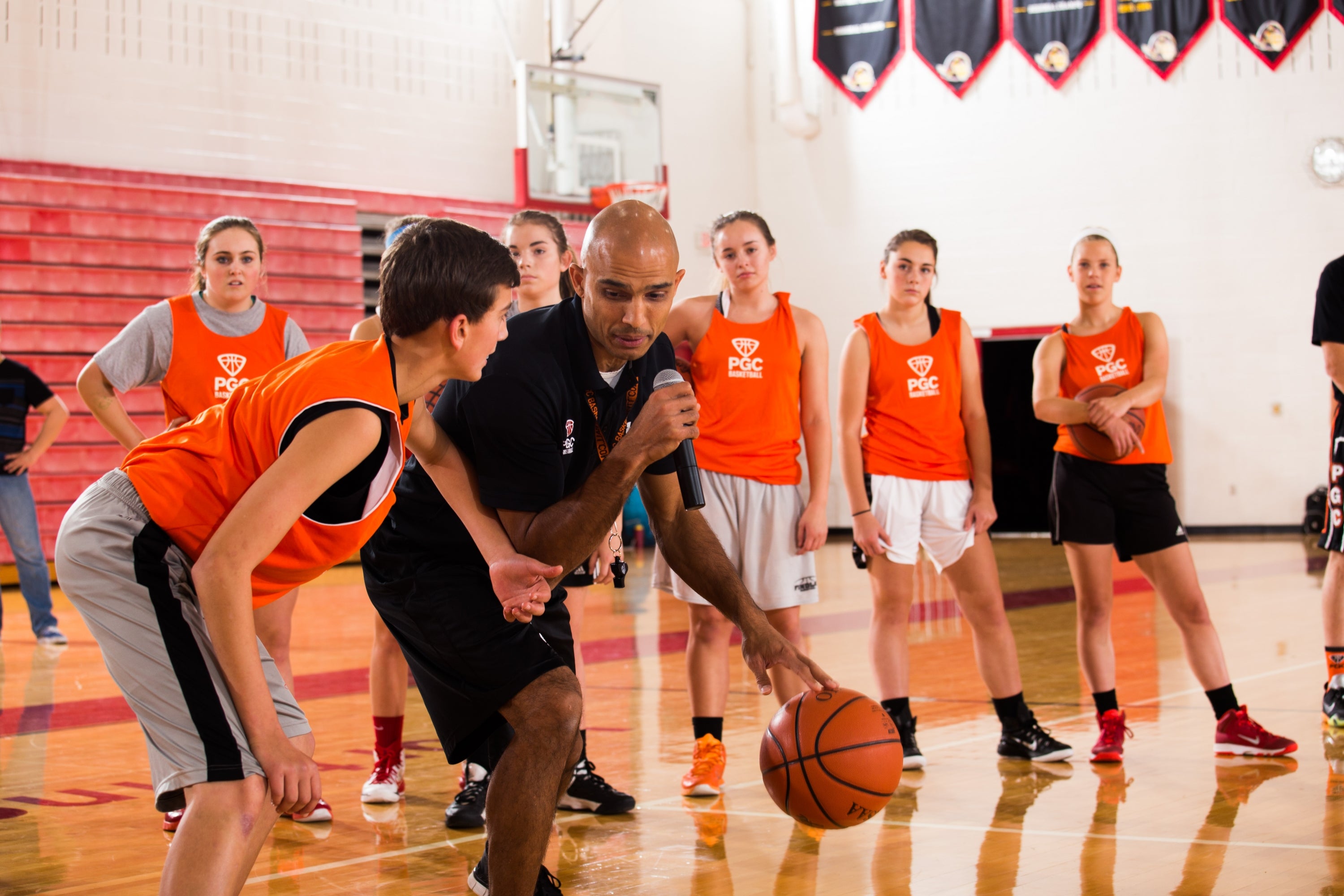 Mano teaching basketball