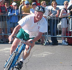 David Johnston biking in a triathlon