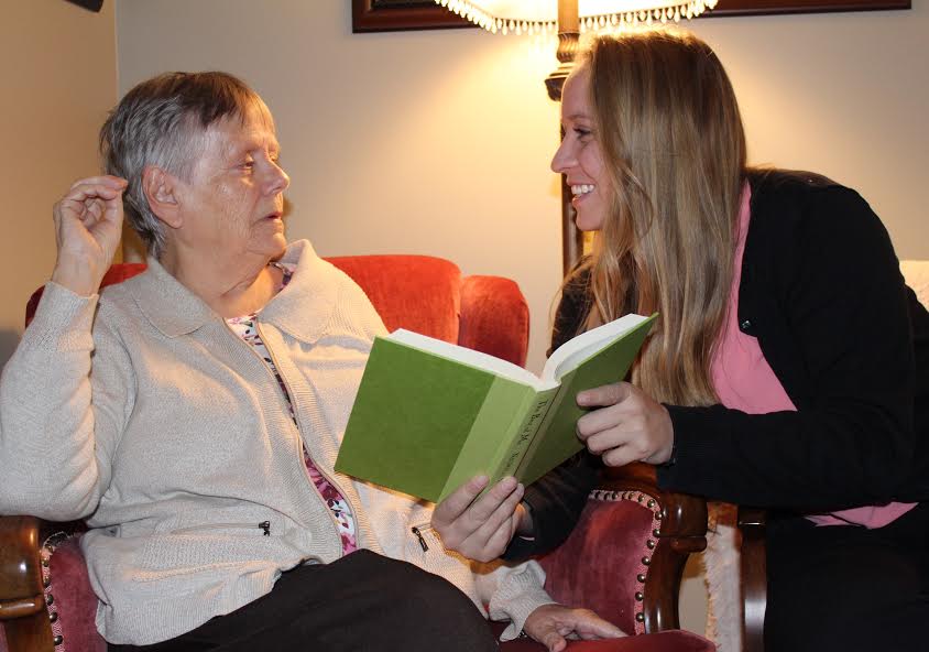 Rachael reading with her grandmother