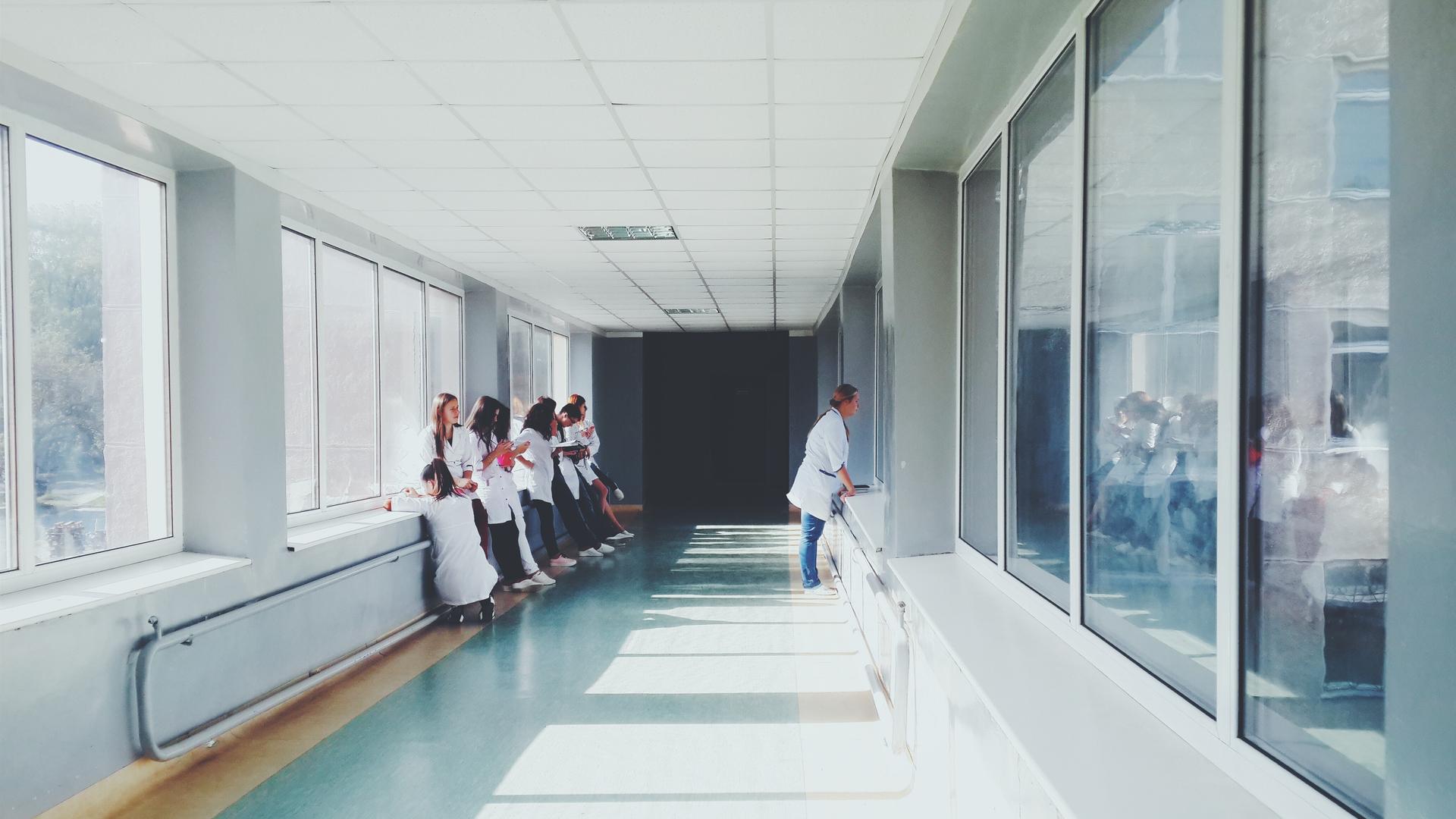 Hospital workers in a hallway